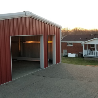Red Metal Two-Bay Garage With Concrete Driveway - Hutmo from Pittsburgh, PA