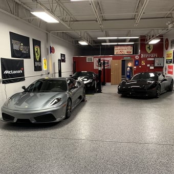 Luxury Garage with Ferraris, Car Lift, and Racing Decor - Jack