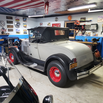 Classic Car Garage with Bar Stools and Wall Decor - Jack from Elmira, NY