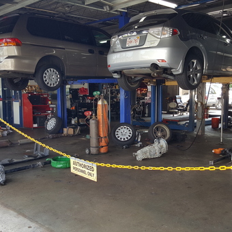 Auto Repair Garage With Vehicle Lifts And Tools - Dinger from Littleton, MA