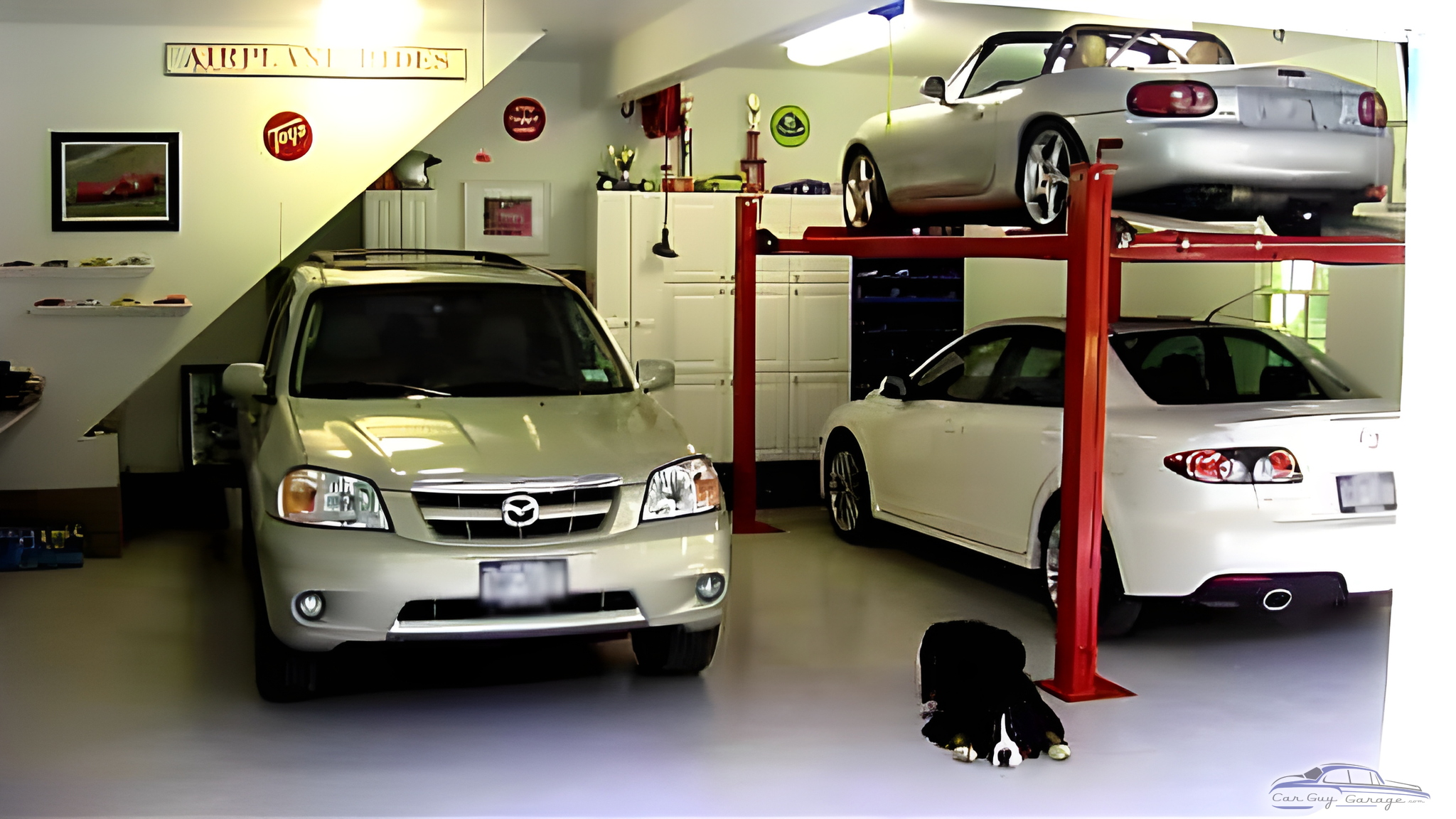 Organized Garage With Car Lift and Mazda Vehicles - PSTN CUP from Poughquag, NY