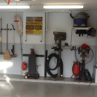Organized garage with tools, workbench, and equipment - Phillip from Allen, TX