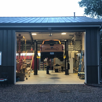 Spacious garage with car lift and organized workspace - Colin from Lakewood, CO