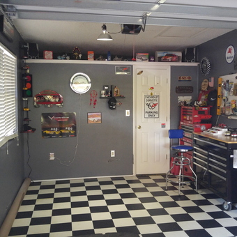 Classic car garage with tool chests and wall decor - downshifter from LARGO, FL