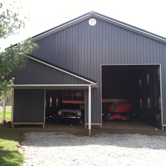 Large Steel Garage With Dual Bays and Vehicles - Dan from Titusville, FL