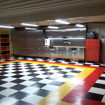 Garage with Checkered Floor, Metal Cabinets, and Tool Storage - Bob from Lubbock, TX