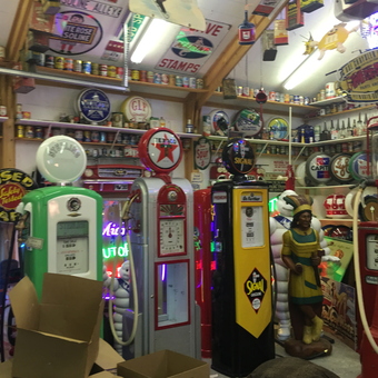 Vintage Gas Pumps and Collectible Signs Display - Big Cheese
