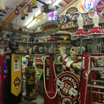 Vintage Gas Pumps, Neon Signs, and Collectibles Display - Big Cheese