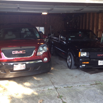 Two GMC Vehicles Parked in Spacious Residential Garage - Steven from Skokie, IL