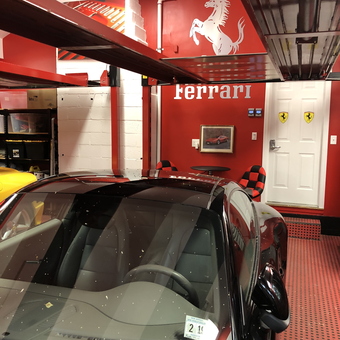 Ferrari-Themed Garage With Car Lift and Red Flooring - Bob from Colts Neck, NJ