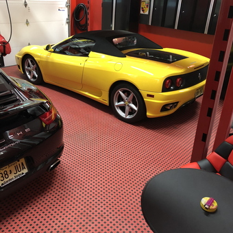 Luxury Garage With Car Lift, Cabinets, and Flooring - Bob from Colts Neck, NJ