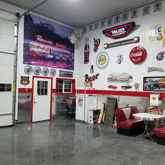 Retro garage with wall signs and diner booth - Doug from Valley, WA
