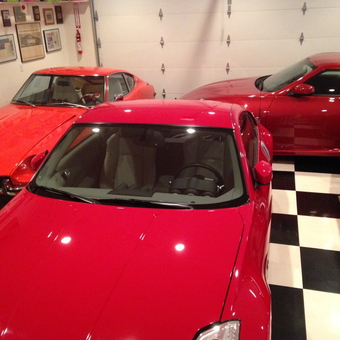 Showroom Garage with Red Sports Cars and Framed Decor - Mark from Finksburg, MD
