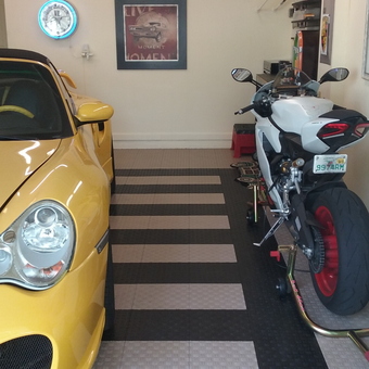 Garage with Yellow Sports Car, Motorcycle, and Wall Art - Bryan from Stuart, FL