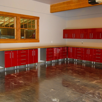 Modern red garage cabinets and workbench setup - Tom