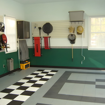 Organized garage with slatwall storage and checkered tiles - Annette from Milton, GA