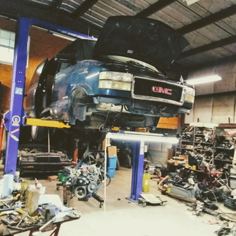 GMC Van on Two-Post Lift in Busy Garage - xrannie from Santa Fe, TN