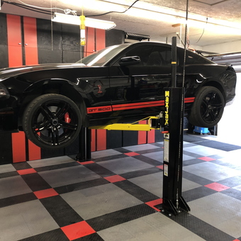 Garage with Car Lift, Race Flooring, and Cabinets - RazorSVT from Fort McMurray