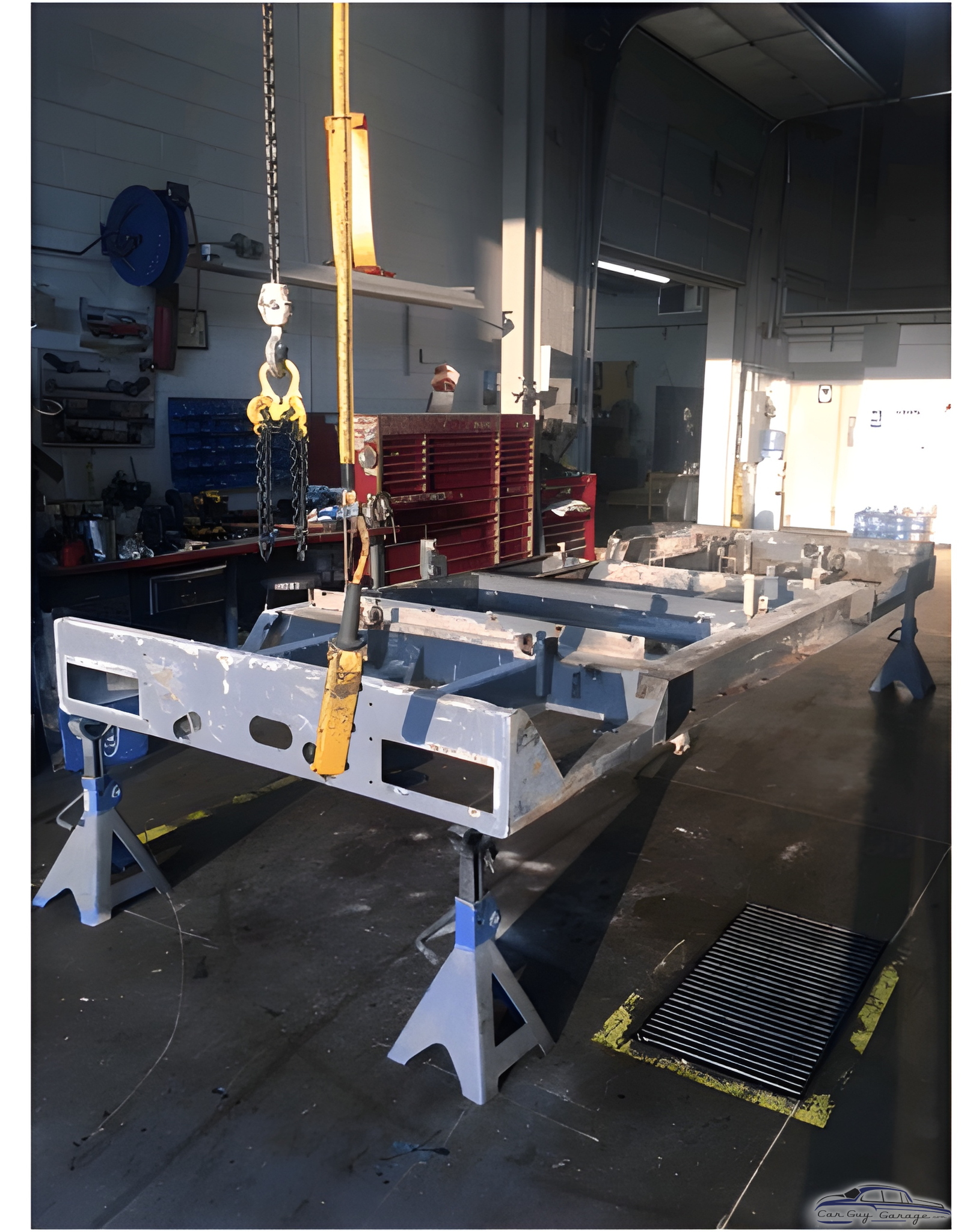 Vehicle Frame on Jack Stands in Workshop - Spike from Maple Grove, MN