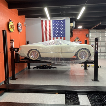 Classic car on four post lift in organized garage - Reuben from Golden Beach, FL