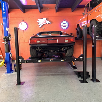 Classic Car Garage with Car Lift and Neon Signs - Reuben from Golden beach, FL