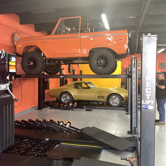 Classic Bronco and Corvette on Car Lift in Garage - Reuben from Golden Beach, FL