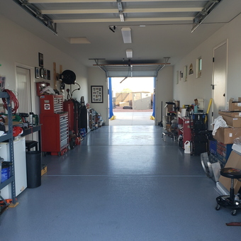 Organized garage with tool cabinets and storage shelves - Chris from GOODYEAR, AZ