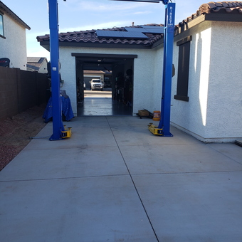 Two-post car lift installed in driveway garage - Chris from GOODYEAR, AZ