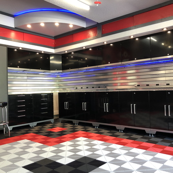 Modern garage with black cabinets and checkered flooring - Dan from St Johns, FL