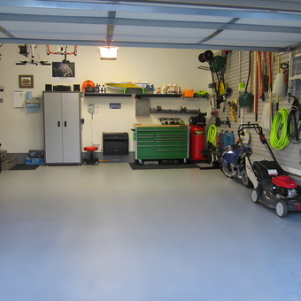 Organized garage with cabinets, tool chest, and wall storage - Jim from La Vista, NE