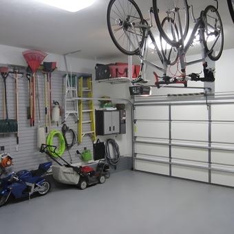 Organized garage with wall storage and bike racks - Jim from La Vista, NE
