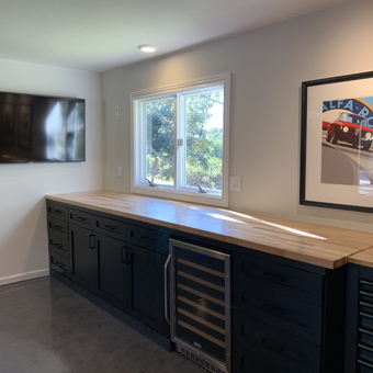 Modern garage with black cabinets and wood countertop - Josh from Pebble Beach, CA