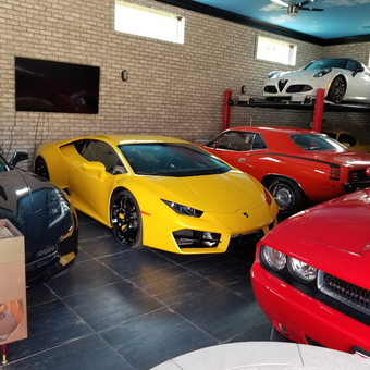 Luxury Sports Cars and Car Lift in Stylish Garage - Mark from Boardman, OH
