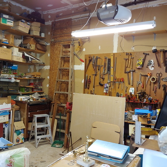 Organized garage workshop with pegboard tool wall and storage shelves - Marv from Southampton, PA