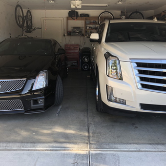Organized garage with tool chest, wall shelves, and bikes - Jared from North Las Vegas, NV