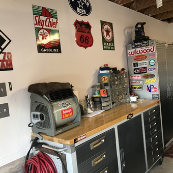 Organized Garage With Tool Cabinets and Wall Decor - PaBon from Sugar Land, TX