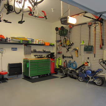 Organized garage with tool chest, slatwall storage, and bikes - Jim from La Vista, NE