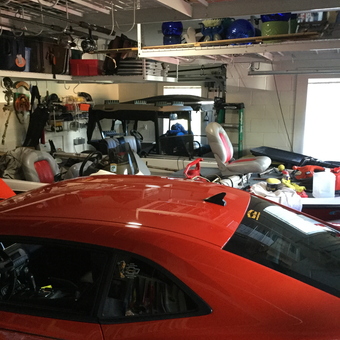 Organized Garage with Overhead Storage and Red Car - Gene from Kissimmee, FL