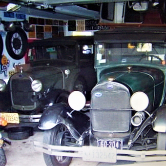 Classic Cars and Motorcycle in Vintage License Plate Garage - Robert from Clifton, NJ