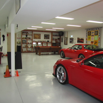 Garage With Red Sports Cars and Wall Decor - Lon from Corvallis, OR