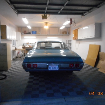 Classic car in organized garage with cabinets and tile floor - Pat from Ollivehurst, CA