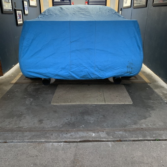 Organized garage with car cover and tool chests - Abo from Longview, TX
