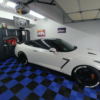 Garage with Nissan GT-R, Cabinets, and Tile Floor - Rob from Matteson, IL