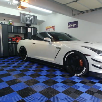 Custom garage with storage cabinets and Nissan GT-R - Rob from Matteson, IL