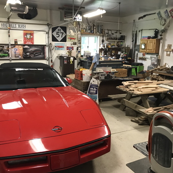 Red Corvette and Woodworking Tools in Organized Garage - Bill from Highland, MI