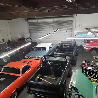Classic cars, tool chests, and auto lifts in garage - Gregory from North Las Vegas, NV