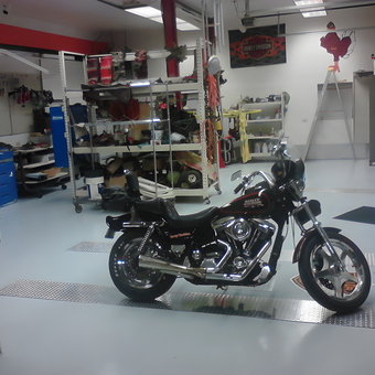 Organized garage with Harley motorcycle and tool storage - Bubba from Max Meadows, VA