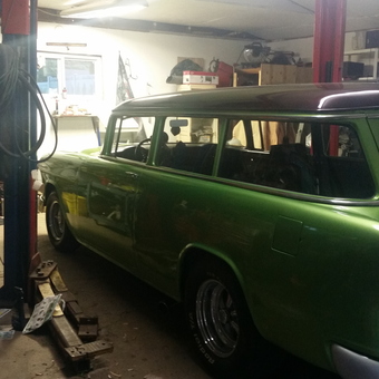 Classic Green Wagon and Car Lift in Home Garage - Cherie from Albert Lea, MN