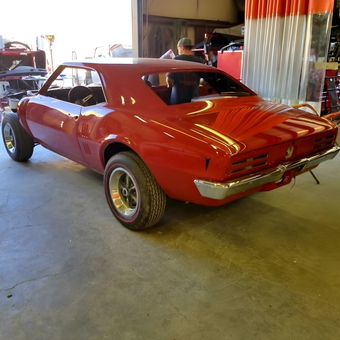 Classic red muscle car restoration in organized garage - Robert from Rocklin, CA