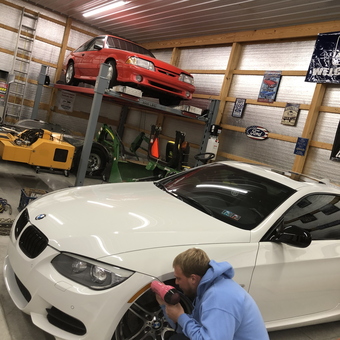Spacious garage with car lift and BMW detailing - Carlee from York, PA